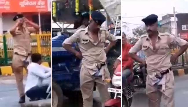 VIDEO: बीच सड़क पी शराब, फिर सुध-बुध खो बैठा नशे में टल्ली पुलिस जवान