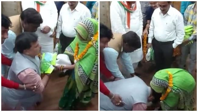 VIDEO: जब सफाईकर्मी के आगे नतमस्तक हुए मंत्रीजी, सिर झुकाकर छुए पैर