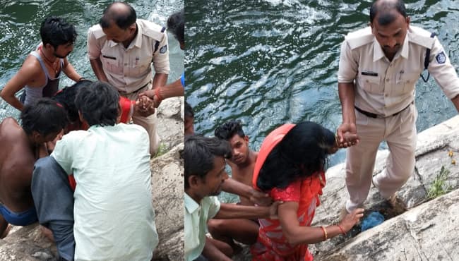 धुंआधार में बही महिला को पुलिस आरक्षक ने बचाया