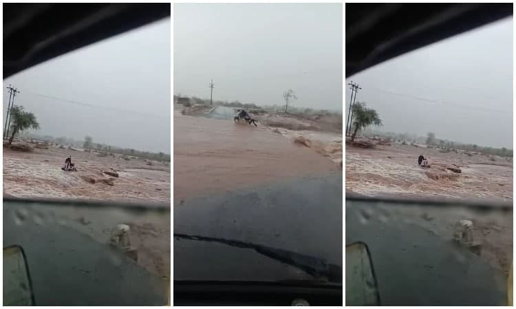VIDEO: उफनते नाले में फंसी जान, बाइक बही, देखिये लाइव वीडियो
