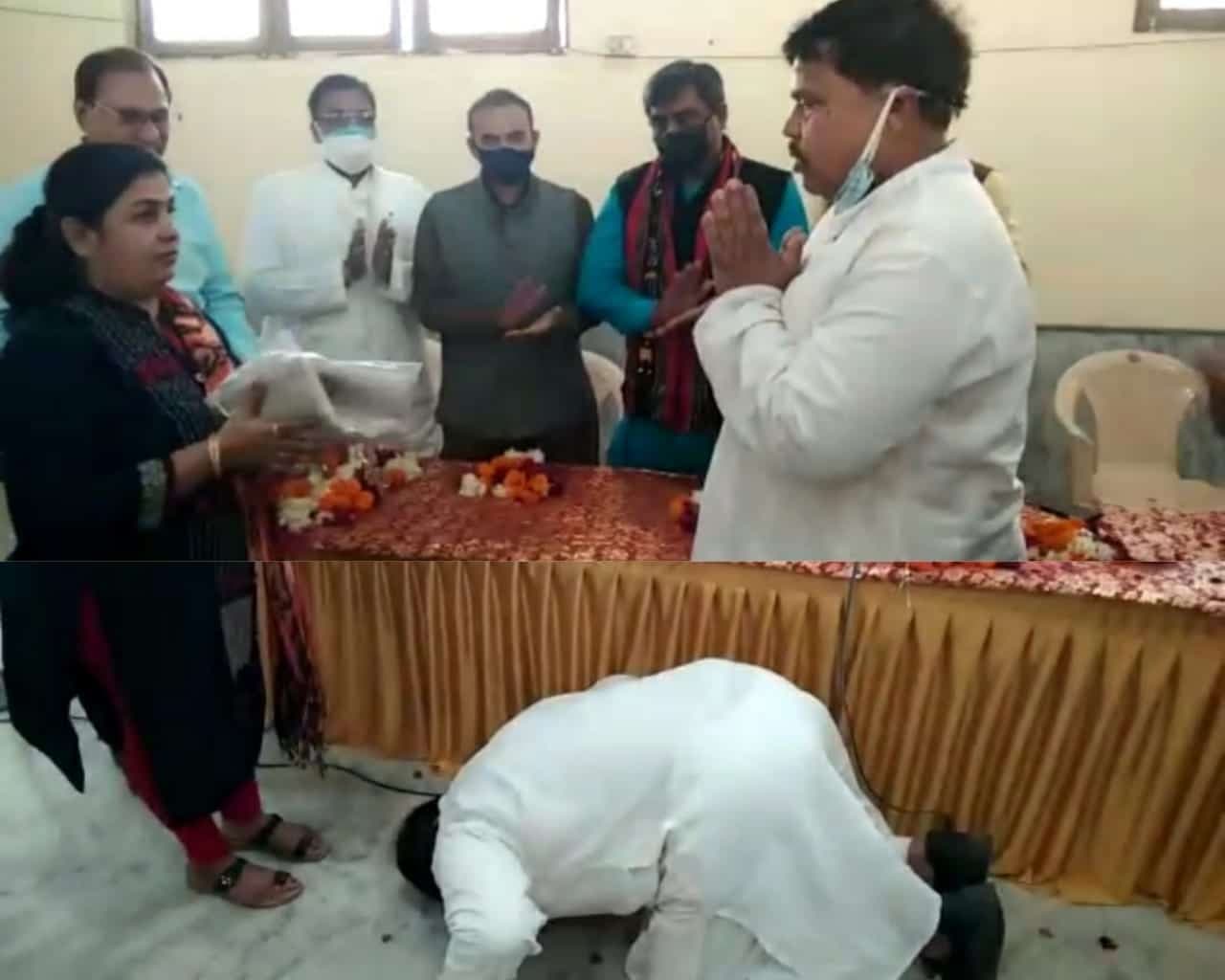 महिला के पैरों में मंत्री ने रखा सिर, कहा मुझे आप पर गर्व है, ये है वजह