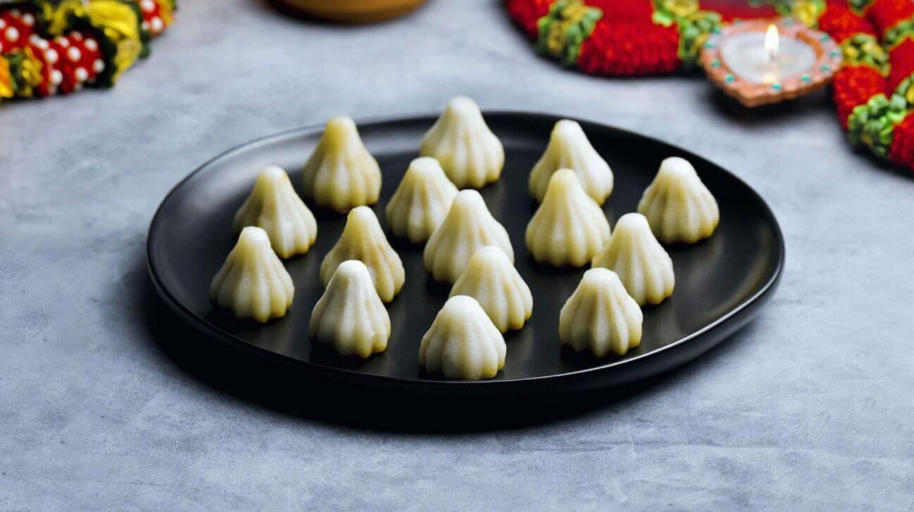 गणेश चतुर्थी 2025: मोदकाची सुरुवात कशी झाली? त्यामागची रंजक कथा आणि तो बाप्पांचा आवडता नैवेद्य का आहे? जाणून घ्या