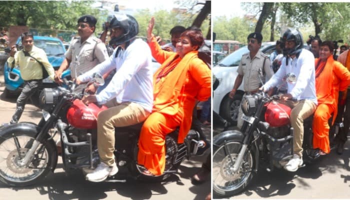कार से उतरकर बिना हेलमेट के मोटरसाइकिल पर निकली साध्वी, गली-गली में घूम कर रही प्रचार