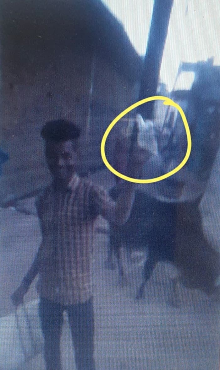 सोशल मीडिया पर कच्ची शराब की थैली लहराते युवक का वीडियो वायरल, पुलिस को खुलेआम चुनौती